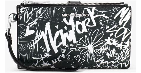 michael kors graffiti tote|Adele Graffiti Leather Smartphone Wallet .